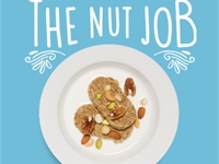 The Nut Job. Two biscuits with mixed nuts and milk.
